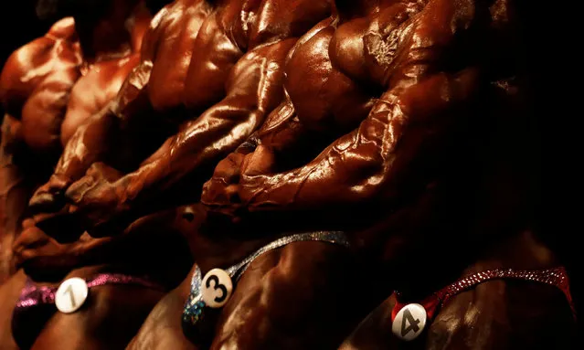 Competitors pose during the Arnold Classic South America bodybuilding event in Sao Paulo, Brazil, April 22, 2017. (Photo by Nacho Doce/Reuters)