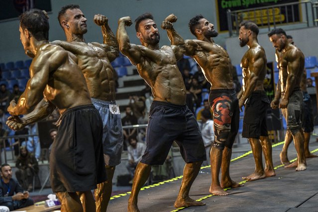 Afghan bodybuilders compete in the Mr. Afghanistan bodybuilding competition in Kabul on July 10, 2024. (Photo by Wakil Kohsar/AFP Photo)