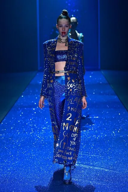 A model walks the runway during the Di$count Universe show at Mercedes-Benz Fashion Week Resort 17 Collections at Carriageworks on May 18, 2016 in Sydney, Australia. (Photo by Stefan Gosatti/Getty Images)