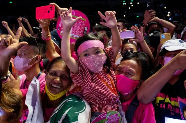 Supporters of Philippine Vice President and presidential candidate Leni Robredo cheer during a Labor Day celebration, in Quezon City, Metro Manila, Philippines, May 1, 2022. (Photo by Lisa Marie David/Reuters)