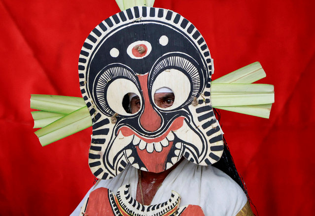 A dancer in traditional attire waits to take part in a performance during the festivities marking the start of the annual harvest festival of “Onam”, in Kochi, India, on September 6, 2024. (Photo by Sivaram V/Reuters)