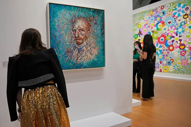 A painting titled “Van Gogh”, left, created by Chinese artist Zeng Fanzhi, is displayed at the Art Basel in Hong Kong, Wednesday, May 25, 2022. Art Basel is one of the world's most prestigious modern and contemporary art exhibitions. (Photo by Kin Cheung/AP Photo)