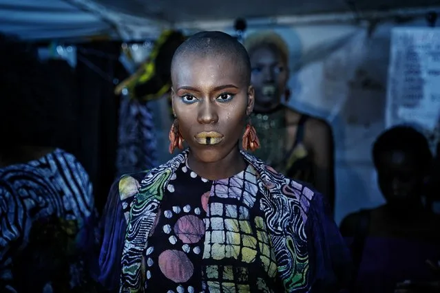 A models waits backstage during Dakar Fashion Week in the Senegalese capital, Friday June 30, 2017. (Photo by Finbarr O'Reilly/AP Photo)