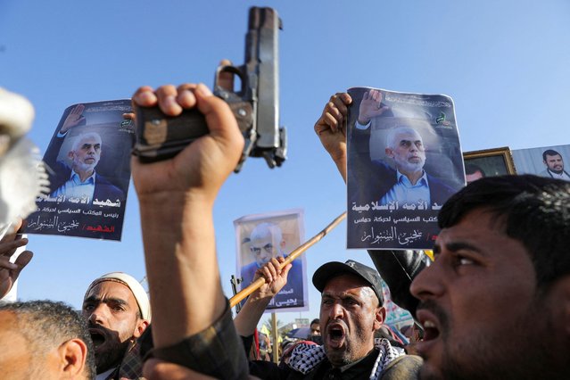 Protesters, mainly Houthi supporters, hold posters showing the late Hamas leader Yahya Sinwar as they rally to show support to Lebanon's Hezbollah and Palestinians in the Gaza Strip, in Sanaa, Yemen on October 18, 2024. (Photo by Khaled Abdullah/Reuters)