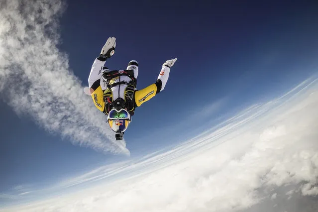 Fred Fugen seen training for a jump over Austria on May 12, 2014. Fearless skydivers jump from an altitude of 10,000 meters above the largest mountain in Europe. Frederic Fugen, 34, and Vincent Reffet, 29, leapt from a plane in the freezing skies above Mont-Blanc in the French Alps. The jump is from such a height the pictures show the curvature of the earth. (Photo by Dominique Daher/Barcroft Media)