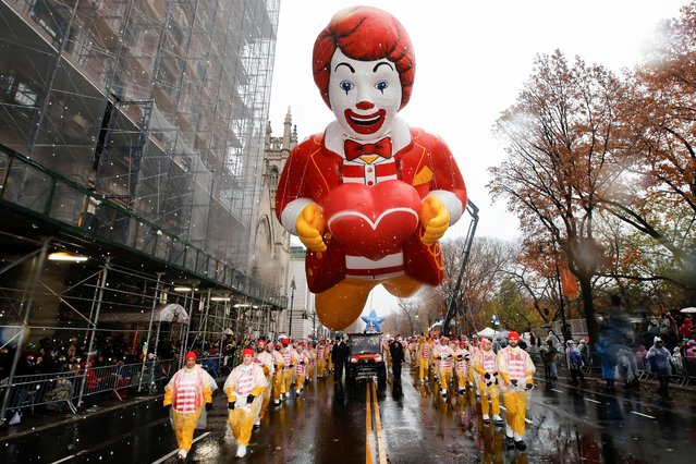 The Ronald McDonald balloon flies during the 98th Macy's Thanksgiving Day Parade in New York City on November 28, 2024. (Photo by Eduardo Munoz/Reuters)
