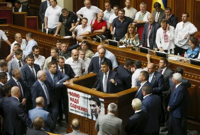 Ukrainian deputies attend a parliament session in Kiev, Ukraine, August 31, 2015. Ukraine's parliament on Monday voted for constitutional changes to give its eastern regions a special status that it hopes will blunt their separatist drive, but divisions among pro-Western lawmakers suggested they will have a rougher ride to become law. (Photo by Valentyn Ogirenko/Reuters)