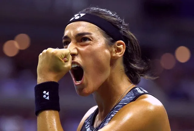 France's Caroline Garcia reacts during her 2022 US Open Tennis tournament women's singles quarter-final match against USA's Coco Gauff at the USTA Billie Jean King National Tennis Center in New York on September 6, 2022. (Photo by Mike Segar/Reuters)