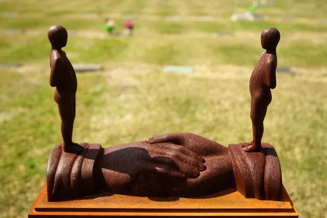 “Hesitation” by Peter Tilley is seen as part of the “Hidden” annual sculpture exhibition at Rookwood Cemetery on September 15, 2014 in Sydney, Australia. (Photo by Mark Kolbe/Getty Images)