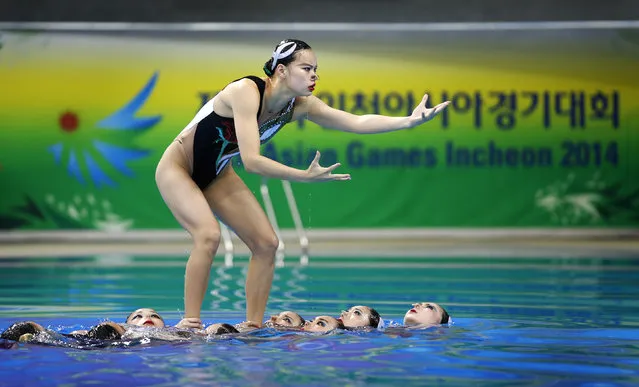 Gold medallists of China perform Synchronised Swimming Free Combination routine at the Munhak Park Tae-hwan Aquatics Center during the 17th Asian Games in Incheon September 23, 2014. (Photo by Tim Wimborne/Reuters)