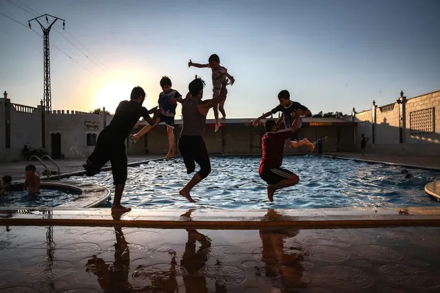 Syrian handicapped kids and youths take part in swimming training at Hutva Education Center in Idlib, Syria on September 07, 2022. (Photo by Muhammed Said/Anadolu Agency via Getty Images)