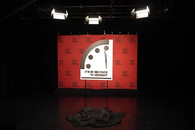 The Doomsday Clock stands in a broadcast studio before a virtual news conference at the National Press Club in Washington, Tuesday, January 24, 2023. The Bulletin of the Atomic Scientists announced that it has moved the minute hand of the Doomsday Clock to 90 seconds to midnight. (Photo by Patrick Semansky/AP Photo)
