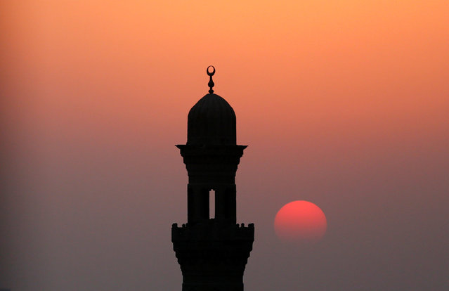 A minaret of a mosque is pictured during sunset on the first day of the New Islamic Hijri year 1438 in old Islamic Cairo, Egypt October 2, 2016. (Photo by Amr Abdallah Dalsh/Reuters)