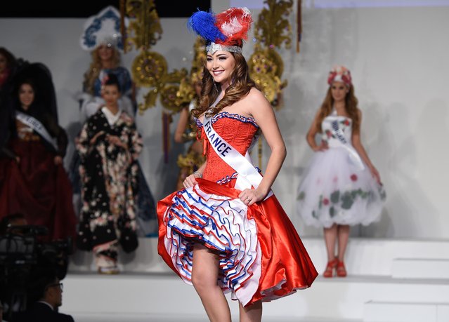 Miss France Charlotte Pirroni displays her national costume during the Miss International beauty pageant in Tokyo on November 5, 2015. (Photo by Toru Yamanaka/AFP Photo)