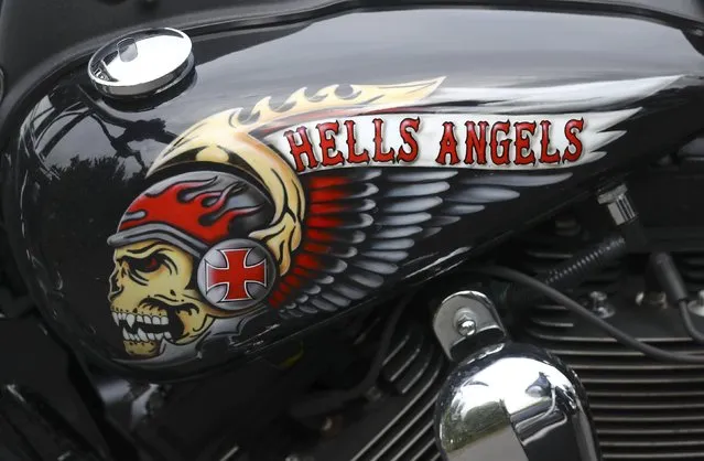 A decorated tank of a Harley Davidson motorbike is pictured at the funeral of Aygun Mucuk, shot president of the Giessen chapter of the Hells Angels in Giessen, Germany, October 12, 2016. (Photo by Kai Pfaffenbach/Reuters)