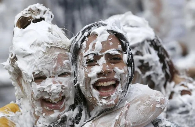 Students from St Andrews University are covered in foam as they take part in the traditional “Raisin Weekend” in the Lower College Lawn, at St Andrews in Scotland, Britain October 17, 2016. (Photo by Russell Cheyne/Reuters)