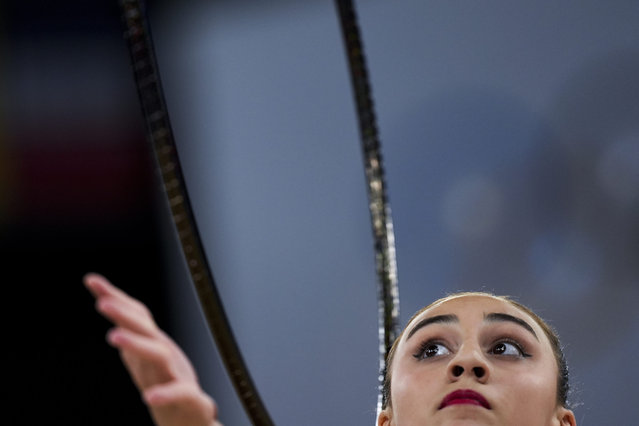 Zohra Aghamirova, of Azerbaijan performs in the rhythmic gymnastics individuals all-round qualification round, at La Chapelle Arena at the 2024 Summer Olympics, Thursday, August 8, 2024, in Paris, France. (Photo by Francisco Seco/AP Photo)