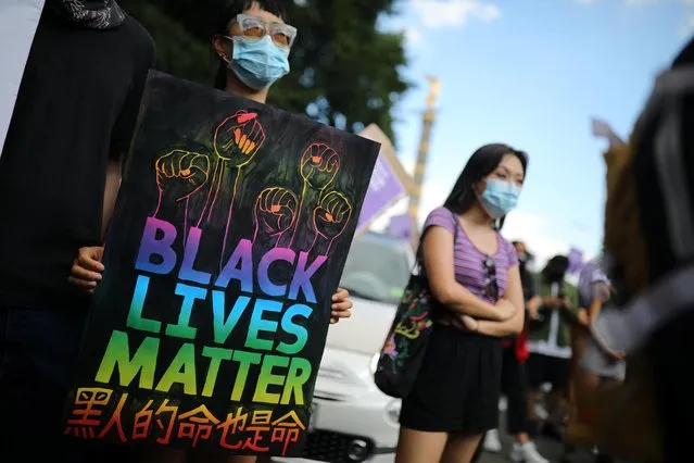 People take part in a Black Lives Matter (BLM) demonstration in Berlin, Germany, July 18, 2020. (Photo by Hannibal Hanschke/Reuters)