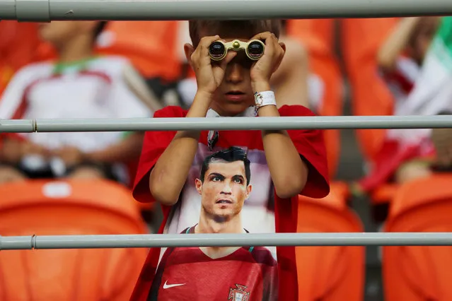 Portugal fan wearing a shirt of Portugal's Cristiano Ronaldo inside the stadium before the Russia 2018 World Cup Group B football match between Iran and Portugal at the Mordovia Arena in Saransk on June 25, 2018. (Photo by Ivan Alvarado/Reuters)