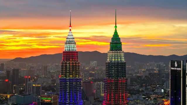 The Petronas Towers in Kuala Lumpur are lit in the colours of the UAE flag, marking Crown Prince of Abu Dhabi Sheikh Khaled's visit to Malaysia on May 21, 2023. (Photo by WAM)