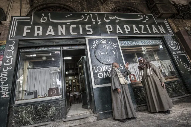 This picture taken on February 23, 2021 shows a view of the Francis Papazian watchmaker's shop in the central Attaba district of Egypt's capital Cairo. Time seems to have stood still at Papazian's, the Armenian watchmaker shop that has stood in Cairo's Attaba Square since 1903 under the arcade of an old Haussmann-style building built in the downtown district's heyday and currently surrounded by street vendors. (Photo by Khaled Desouki/AFP Photo)
