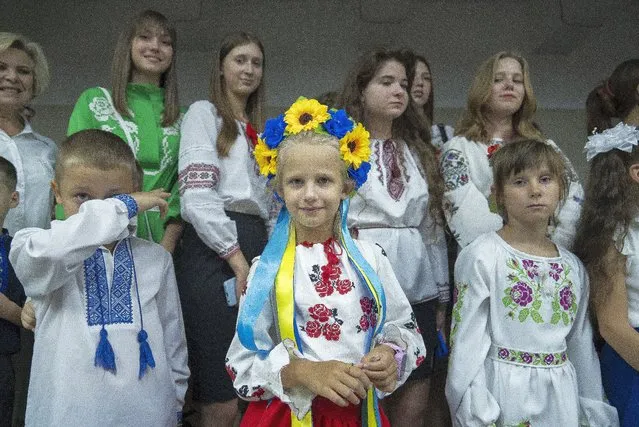 Schoolchildren attend a ceremony on the first day at school in a safe place, an underground subway station,  in Kharkiv, Ukraine, Friday, September 1, 2023. Ukraine marks Sept. 1 as Knowledge Day, as a traditional launch of the academic year. (Photo by Mstyslav Chernov/AP Photo)