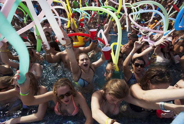 Spring breakers gather at a pool party at a hotel in Cancun March 8, 2015. (Photo by Victor Ruiz Garcia/Reuters)