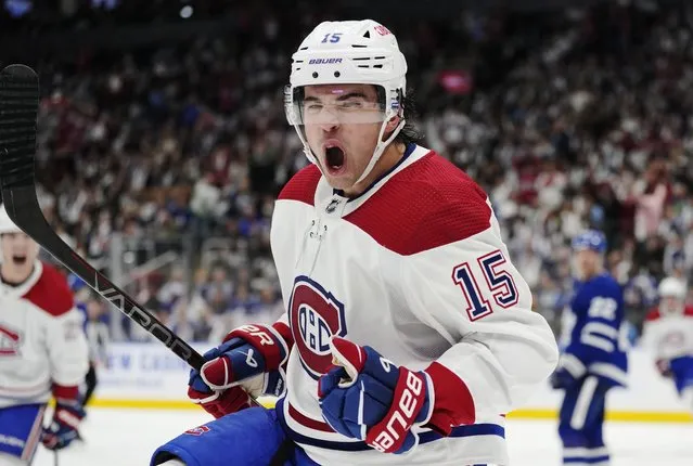 Montreal Canadiens' Alex Newhook (15) celebrates his goal against the Toronto Maple Leafs during the third period of an NHL hockey game Wednesday, October 11, 2023, in Toronto. (Photo by Frank Gunn/The Canadian Press via AP Photo)