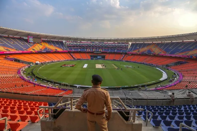 Indian security personnel stand guard at Narendra Modi Stadium in Ahmedabad, India, 13 October 2023. India will play against Pakistan on 14 October in a ICC Men's Cricket World Cup match at Narendra Modi Stadium. (Photo by Divyakant Solanki/EPA)