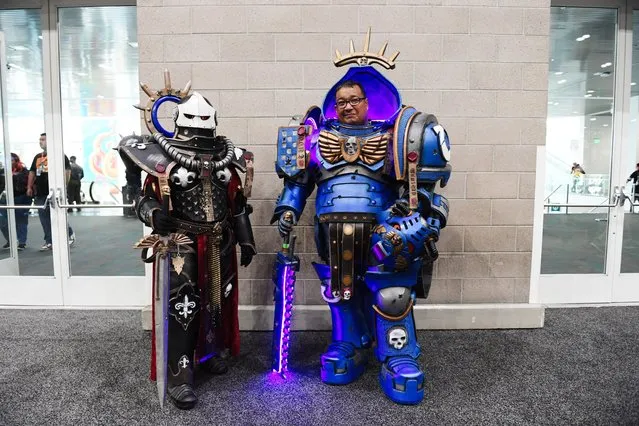 Cosplayers dressed as a Battle Sister and an Ultramarine from Warhammer 40,000 pose during Los Angeles Comic Con at Los Angeles Convention Center on December 03, 2023 in Los Angeles, California. (Photo by Chelsea Guglielmino/Getty Images)