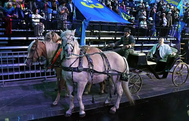 Leader of the Liberal Democratic Party of Russia (LDPR), Vladimir Zhirinovsky, arrives on a troika, the traditional Russian carriage pulled by three horses, to the LDPR convention in Moscow, Russia, 13 September 2021. LDPR leader Vladimir Zhirinovsky headed the list of the party in the elections to the Russian State Duma. In total, the party list included 219 people. Elections to the Russian State Duma will be held from 17 to 19 September 2021. (Photo by Maxim Shipenkov/EPA/EFE)