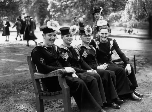 8th May 1945: Canadian sailors resting in the park during celebrations in London on VE Day. (Photo by Keystone/Getty Images)