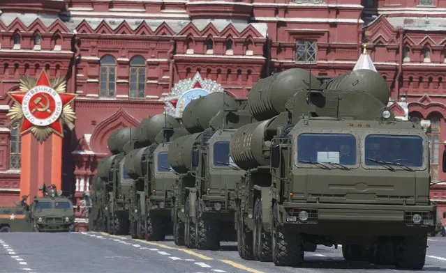 Russian S-400 Triumph medium-range and long-range surface-to-air missile systems drive during the Victory Day parade at Red Square in Moscow, Russia, May 9, 2015. (Photo by Sergei Karpukhin/Reuters)