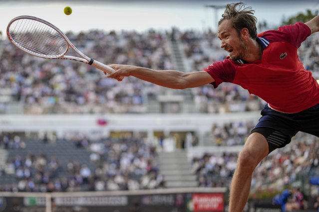 Russia's Daniil Medvedev returns the ball to Serbia's Hamad Medjedovic at the Italian Open tennis tournament, in Rome, Monday, May 13, 2024. (Photo by Andrew Medichini/AP Photo)