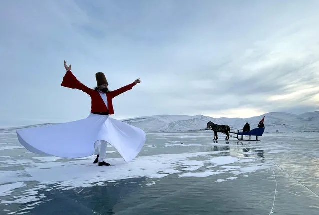 A whirling dervish performs on frozen Lake Cildir in Ardahan, Turkiye on January 22, 2022. (Photo by Gunay Nuh/Anadolu Agency via Getty Images)