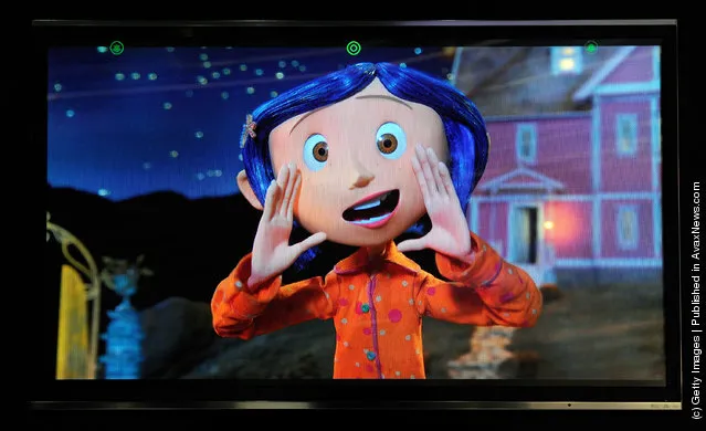 A glasses-free Toshiba 55-inch 3-D 4x full HD TV shows the movie, 'Coraline' at the 2012 International Consumer Electronics Show
