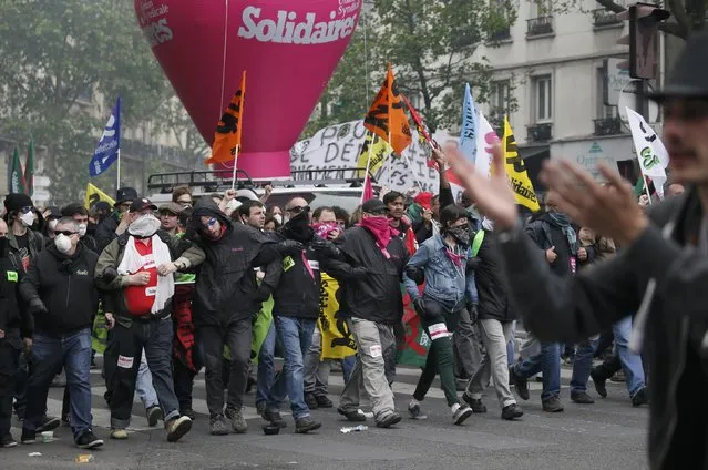 Protestors march during a demonstration against French labour law reform in Paris, France, May 12, 2016. (Photo by Gonzalo Fuentes/Reuters)