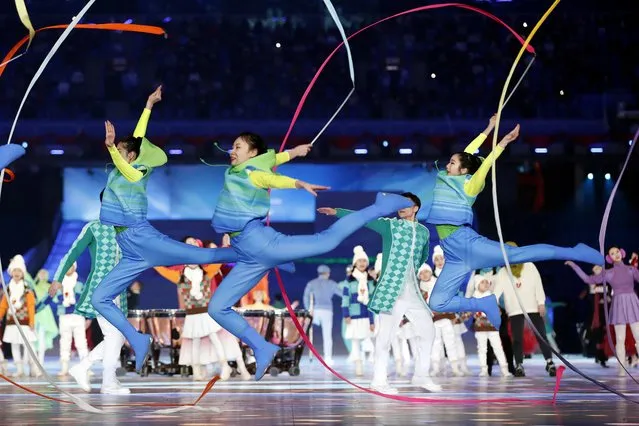 Performers are seen during the Closing Ceremony on day nine of the 2022 Beijing Winter Paralympics at Beijing National Stadium on March 13, 2022 in Beijing, China. (Photo by Peter Cziborra/Reuters)