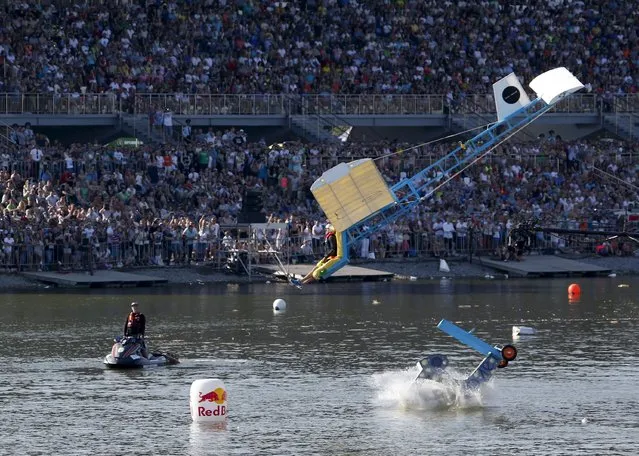A participant attempts to control a craft during the Red Bull Flugtag Russia 2015 competition in Moscow, Russia, July 26, 2015. (Photo by Sergei Karpukhin/Reuters)