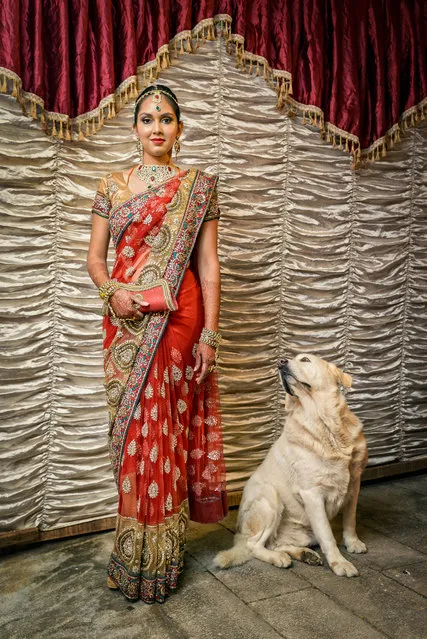 “The Bride and the Dog”. I was covering an Indian wedding in Mauritius. The bride had just finished with her makeup, hair and dress and wanted me to take a picture of her. Just as I was about to shoot, she stopped me and asked her family to bring her dog “Mitch”. He sat by her and just as I snapped, he looked at her with curiosity as if he wanted to be sure it was her. Photo location: Mauritius, Vacoas. (Photo and caption by Jean Jacques Fabien/National Geographic Photo Contest)
