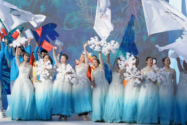 Performers attend the volunteers global recruitment programme launch event for the Beijing 2022 Olympic and Paralympic Winter Games, in Beijing, China, 05 December 2019. The organizing committee for the 2022 Winter Olympics launched its volunteers global recruitment programme to recruit 27,000 volunteers for the Olympic Winter Games and 12,000 volunteers for the Paralympic Winter Games. (Photo by Wu Hong/EPA/EFE)
