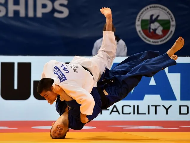 Yevhen Honcharko (Up) of Ukraine competes against Lennart Slamberger of Gernamy in the round 3 of the Men's 66-kg category of the European Judo Championships in Sofia, Bulgaria, 29 April 2022. (Photo by Vassil Donev/EPA/EFE)