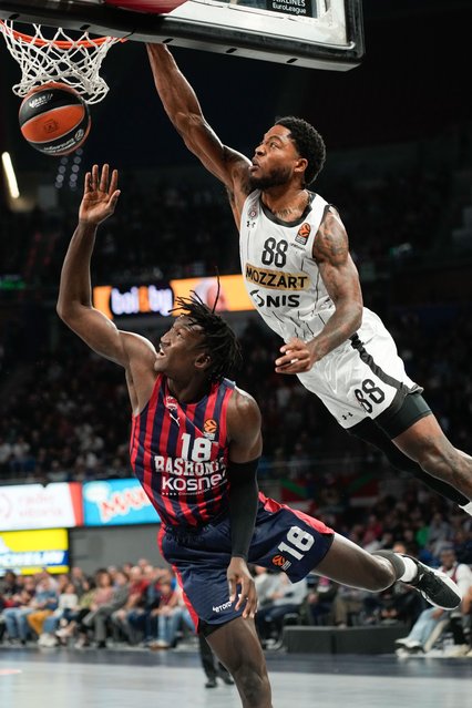 Partizan's Tyrique Jones (R) in action against Baskonia's Khalifa Diop (L) during the EuroLeague Basketball match between Baskonia Vitoria-Gasteiz and Partizan Belgrade, in Vitoria, Spain, 03 October 2024. (Photo by Adrian Ruiz Hierro/EPA/EFE)