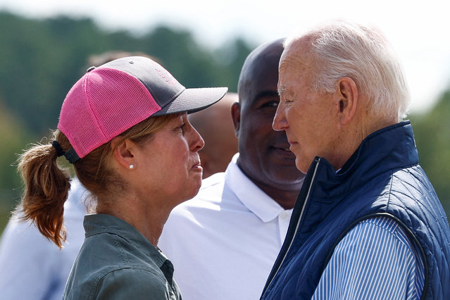 U.S. President Joe Biden greets Esther Manheimer, mayor of Asheville, North Carolina, at Greenville-Spartanburg International Airport in Greer, South Carolina, U.S., October 2, 2024. (Photo by Evelyn Hockstein/Reuters)