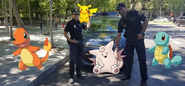 Spanish police pose with “Pokemon Go” figures in this handout picture provided by the Spanish Interior Ministry on July 18, 2016. (Photo by Reuters/Spanish Interior Ministry)