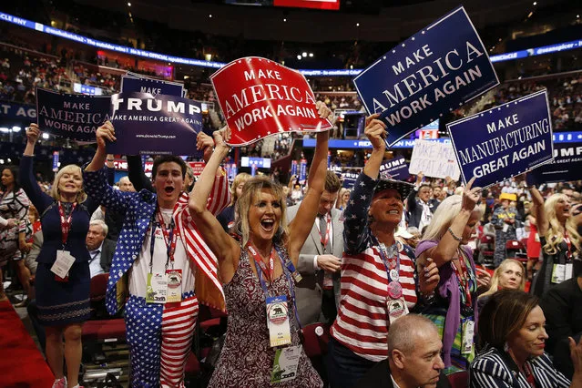 Delegates react to speeches on the second day of the 2016 Republican National Convention at Quicken Loans Arena in Cleveland, Ohio, USA, 19 July 2016. (Photo by Michael Reynolds/EPA)