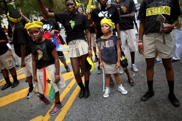 Revelers participate in the annual West Indian Day parade held on September 1, 2014 in the Brooklyn borough of New York City. The parade, which draws a crowd of a million plus, celebrates Caribbean culture. (Photo by Yana Paskova/Getty Images)