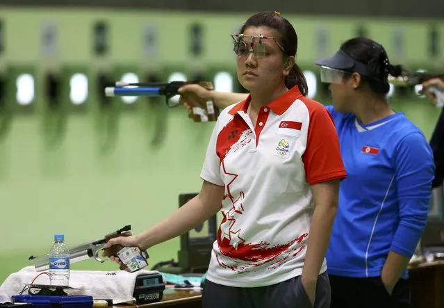 2016 Rio Olympics, Shooting, Preliminary, Women's 10m Air Pistol Qualification, Olympic Shooting Centre, Rio de Janeiro, Brazil on August 7, 2016. Teo Shun Xie (SIN) of Singapore reacts. (Photo by Jeremy Lee/Reuters)