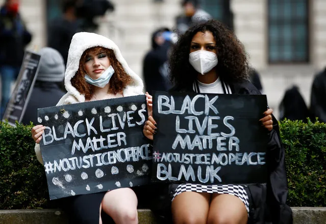 Demonstrators wearing protective face masks during a Black Lives Matter protest in Parliament Square, following the death of George Floyd who died in police custody in Minneapolis, London, Britain, June 6, 2020. (Photo by Henry Nicholls/Reuters)