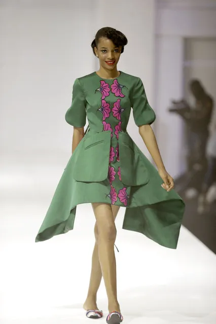 A model displays creation by Ituen Basi during the Fashion Week in Lagos, Nigeria, Saturday, November 11, 2017. (Photo by Sunday Alamba/AP Photo)